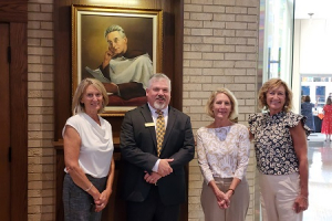 Members of the Brandsma family with Carmel's President Dr. Brad Bonham